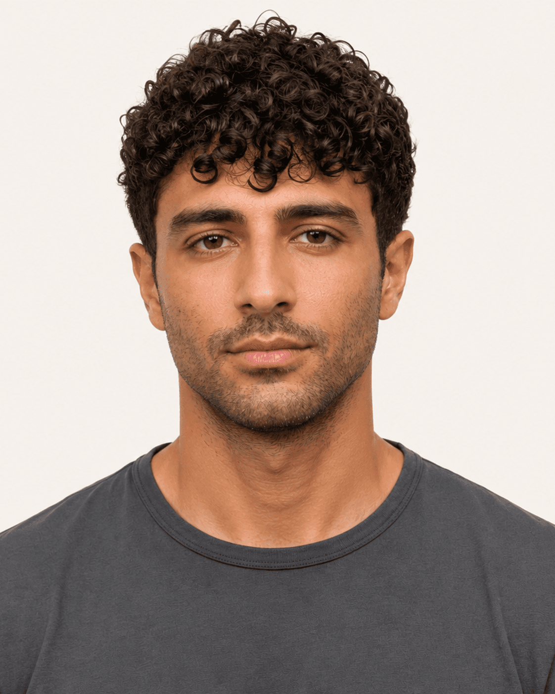 Front view of a curly fringe crop