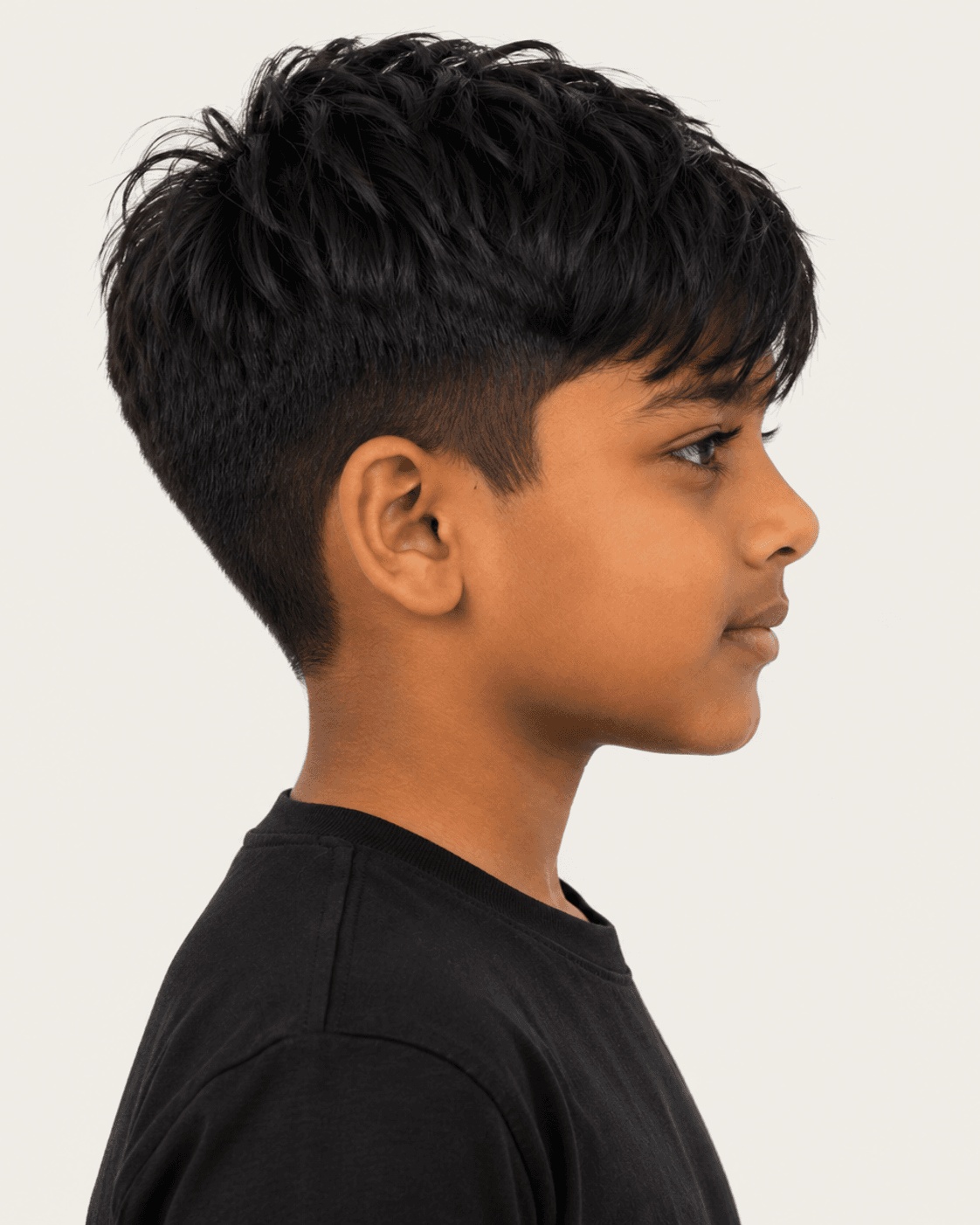 Side profile of a textured messy fringe showing the taper and fringe drop