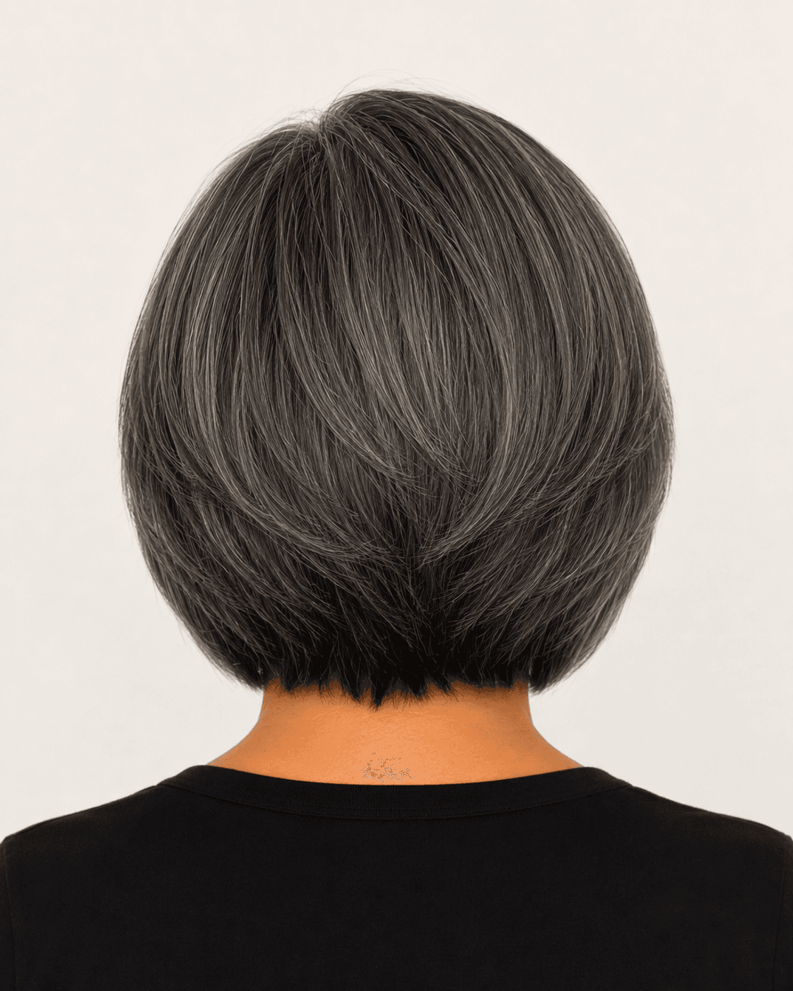 Rear view of a modern layered bob showing the graduated nape and symmetry