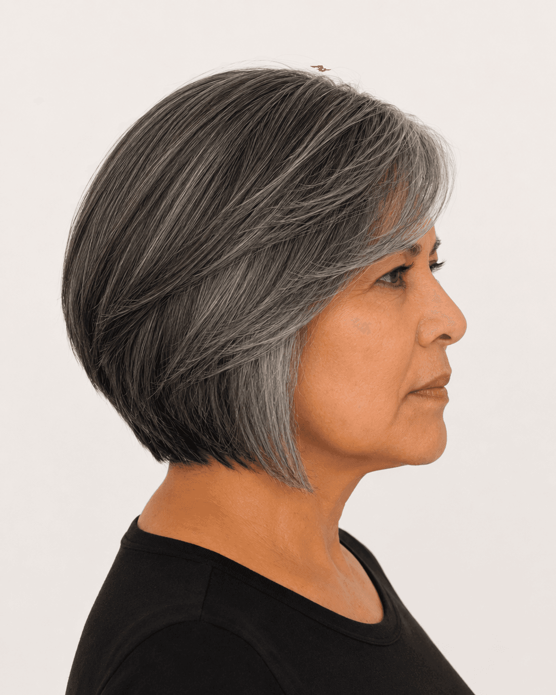 Side profile of a modern layered bob showing the graduated front corner and nape