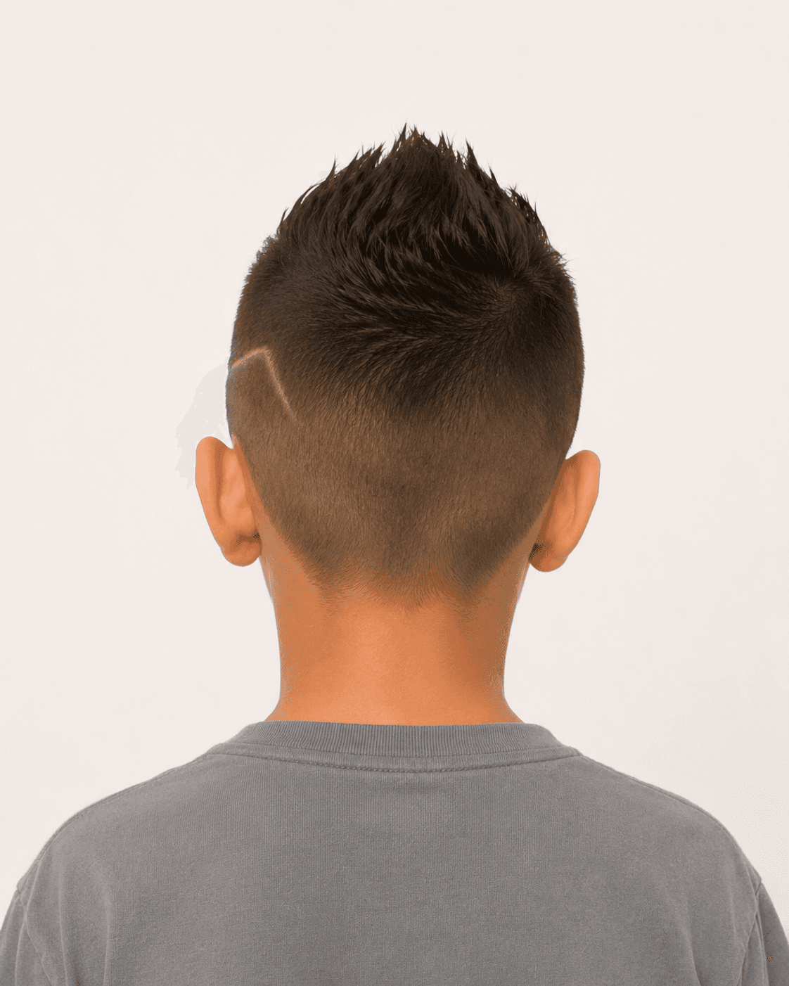 Rear view of a spiky faux hawk showing the fade and design line from behind