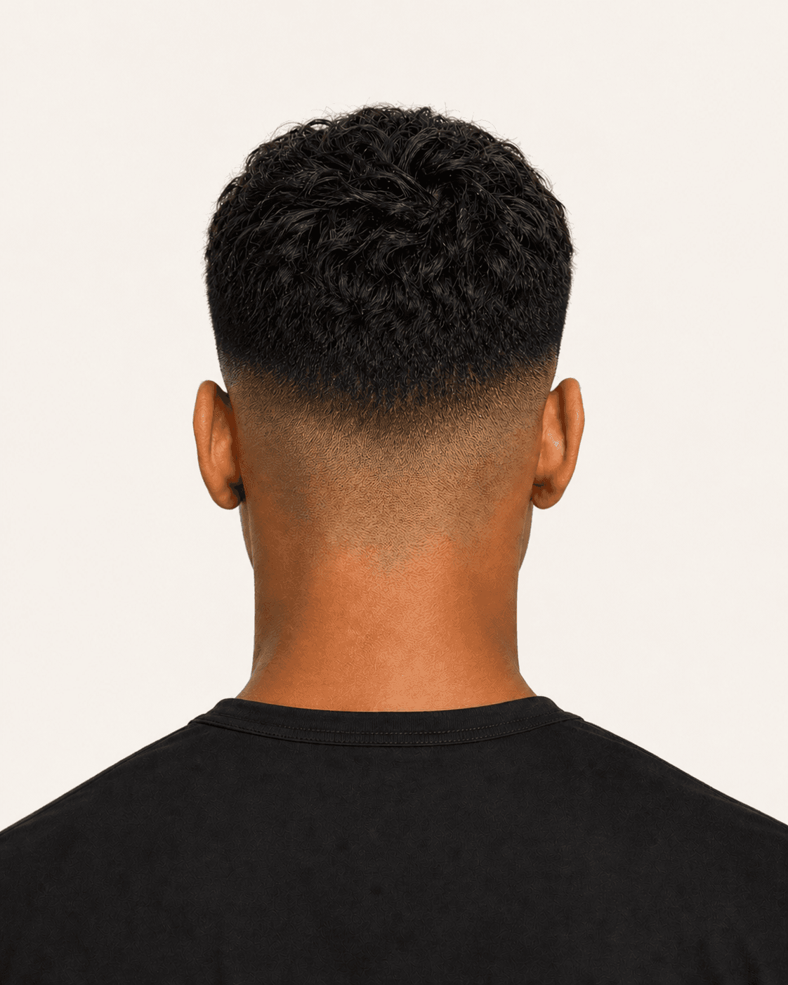 Annotated rear construction map for Textured French Crop. Rear view of a textured French crop showing the fade gradient, crown, and natural neckline